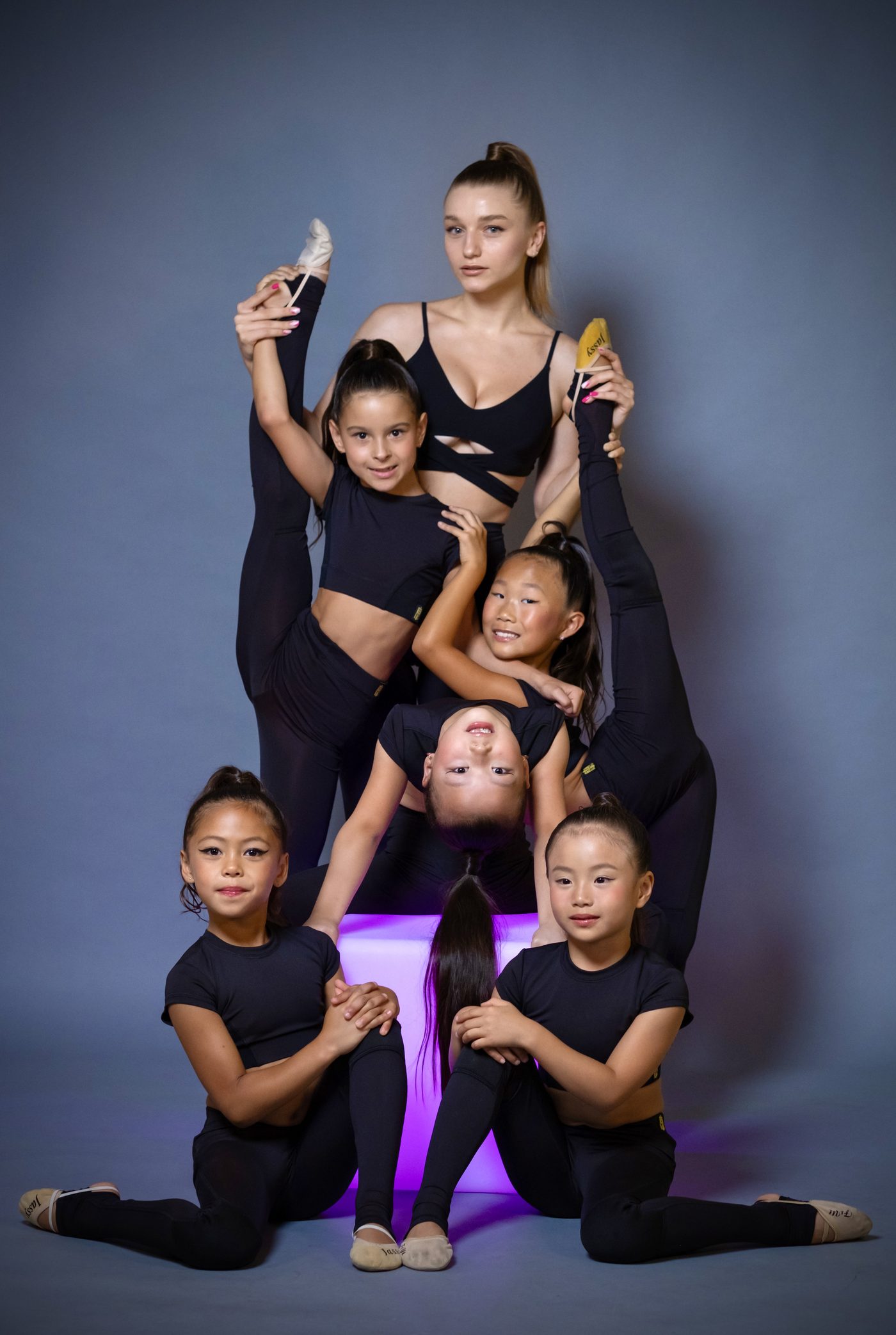 SRG Academy competitive team with head coach